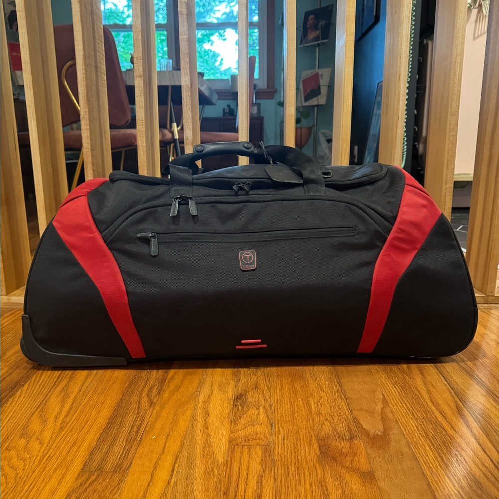 Tumi Black and Red Duffel Bag Durable Travel Essential